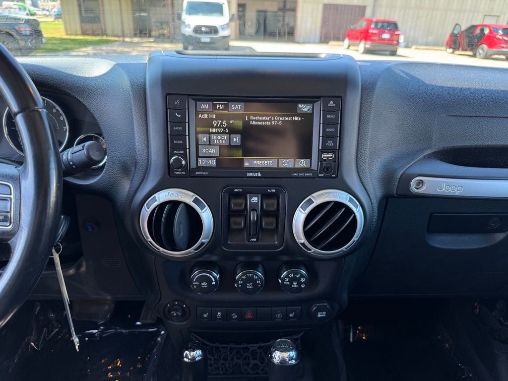 Used 2016 Jeep Wrangler Unlimited Rubicon with VIN 1C4BJWFG1GL339663 for sale in Rochester, Minnesota