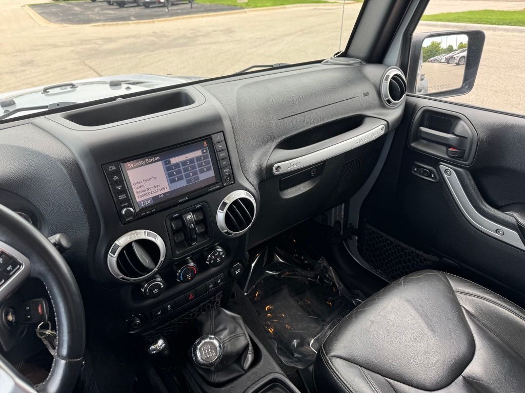 Used 2015 Jeep Wrangler Unlimited Rubicon with VIN 1C4BJWFG2FL530393 for sale in Rochester, Minnesota