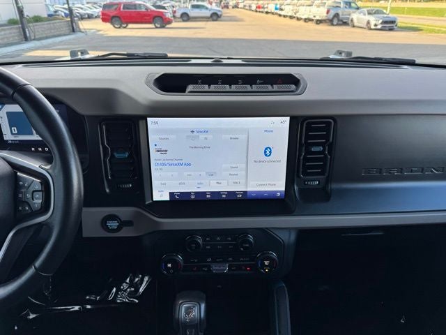 Used 2023 Ford Bronco 4-Door Wildtrak with VIN 1FMEE5DP2PLB68612 for sale in Rochester, Minnesota