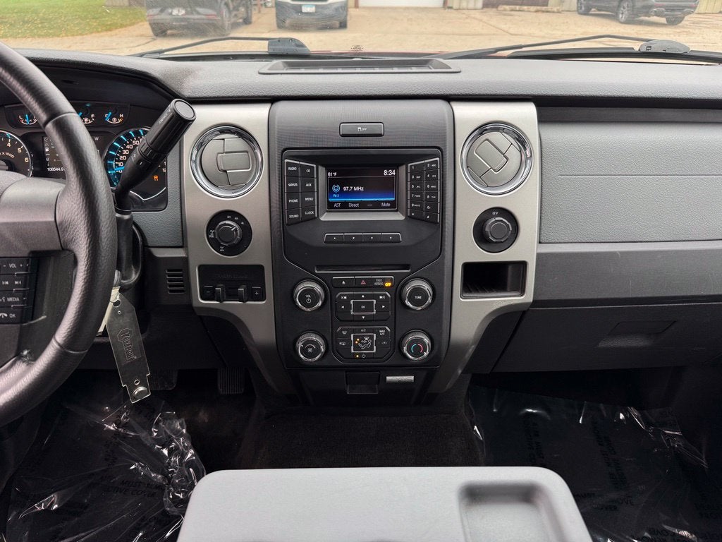 Used 2014 Ford F-150 XLT with VIN 1FTFW1EF5EKF24932 for sale in Rochester, Minnesota