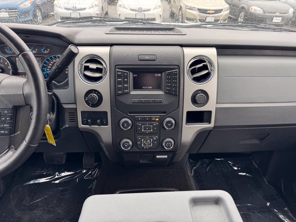 Used 2014 Ford F-150 XLT with VIN 1FTFW1ET1EFC53124 for sale in Rochester, Minnesota